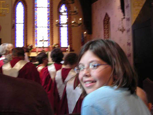 Young girl smiling during religious services